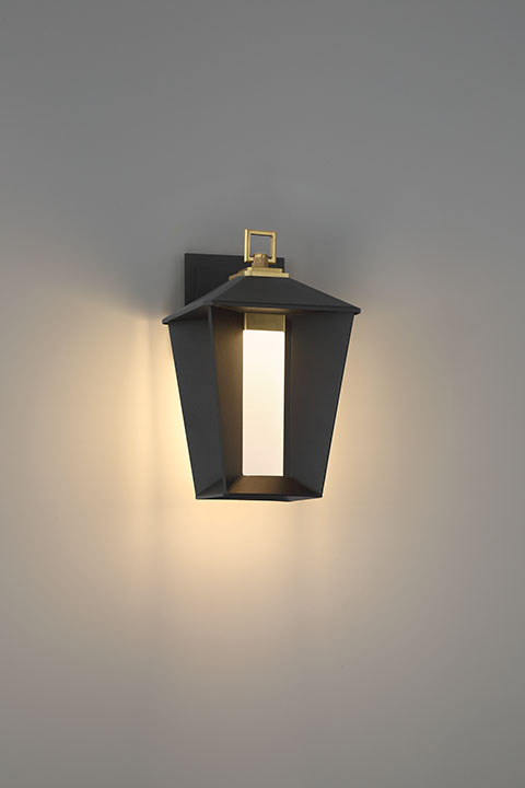 Andson outdoor wall sconce illuminated on wall