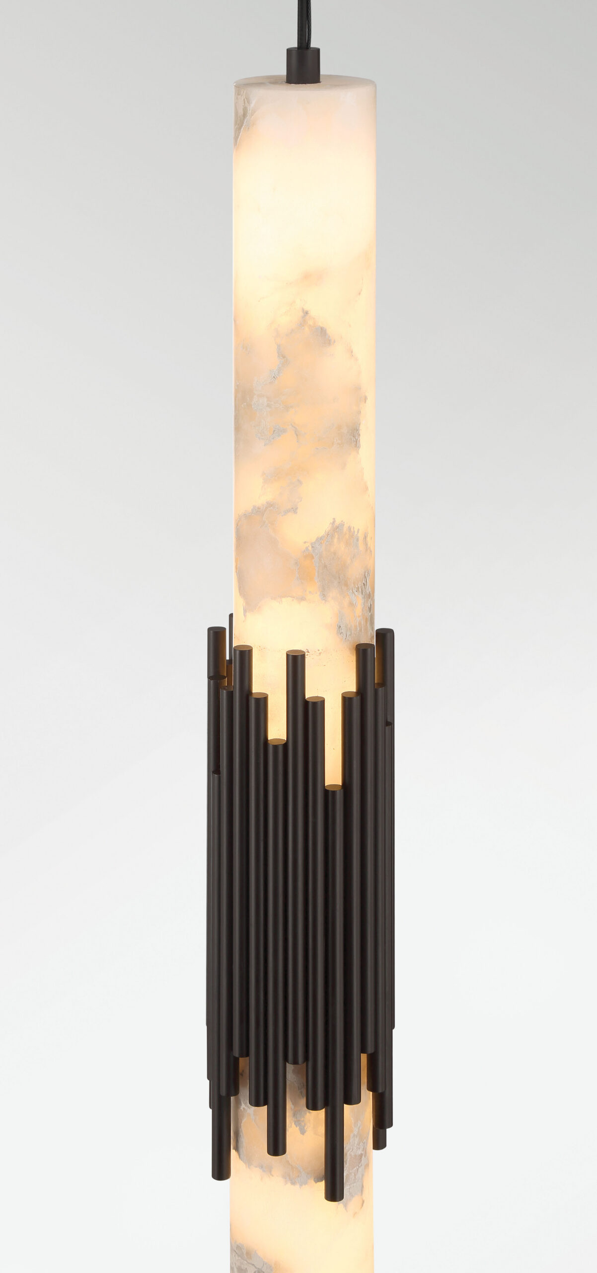 Venna Antique Brass pendant glowing through alabaster